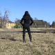 A hooded woman takes a shit outdoors in a field at an abandoned military base. Presented in 720P HD. Over 2 minutes.